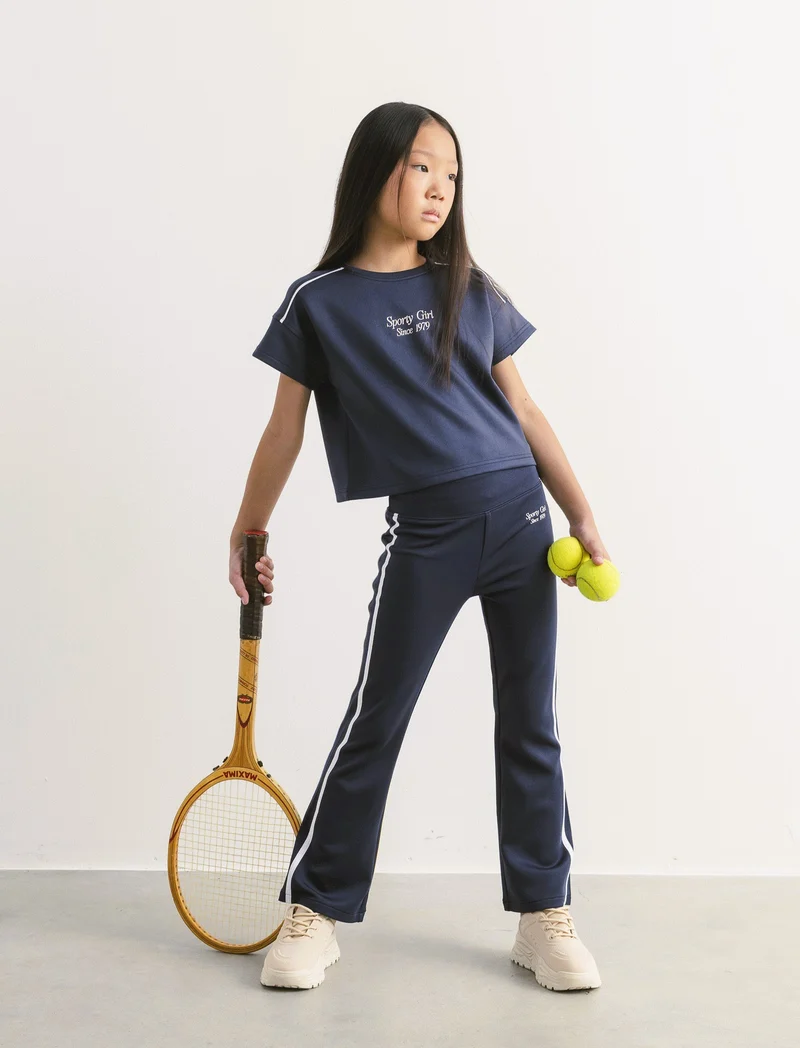 Leggings in tessuto tecnico con profili a contrasto. - Blu
